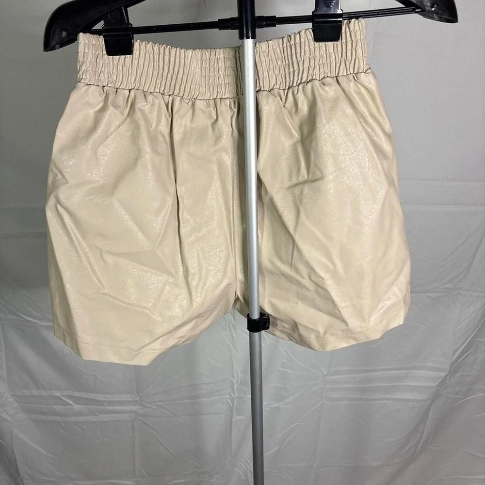 Princess Polly Cream Pleather shorts